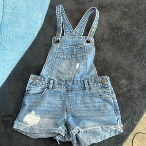 Blue washed shorts overalls.